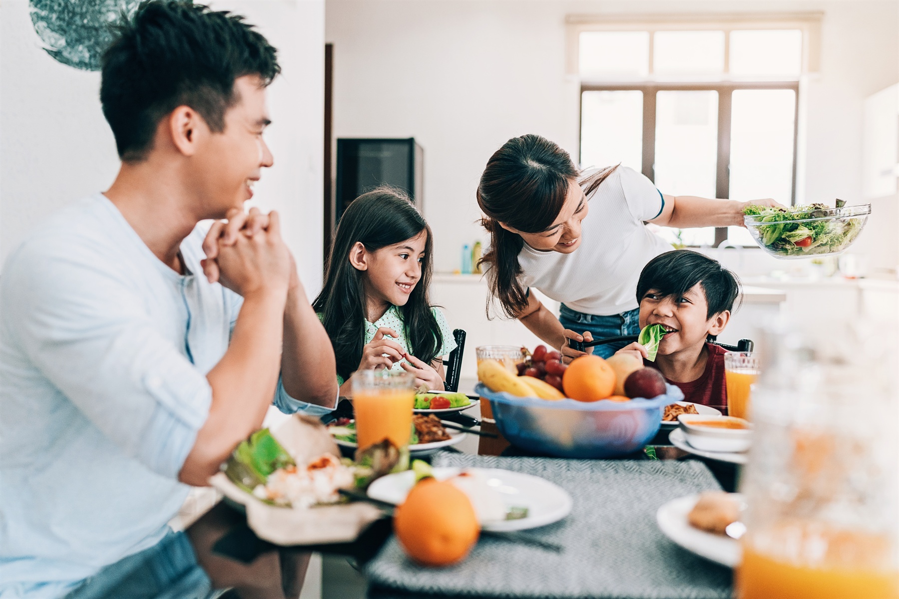 Family sharing a meal together at the table